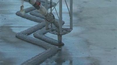 US Army Corps of Engineers 3-D printing a hut in 24 hours