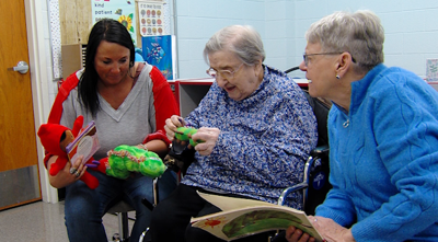 Decades later, a century-old teacher reconnects with mentees