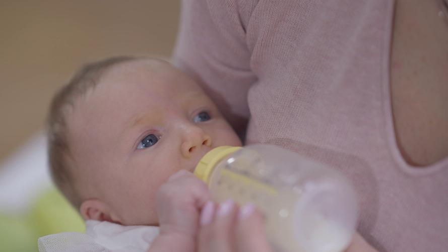 Baby infant with bottle