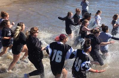 Crowds take freezing swim in 'Polar Plunge'
