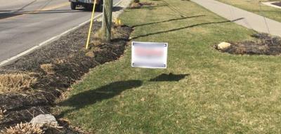 Yard sign in public right of way