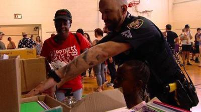 Urbana Police donate supplies to Wiley Elementary