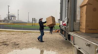 Grady Hainaut loading a trailer