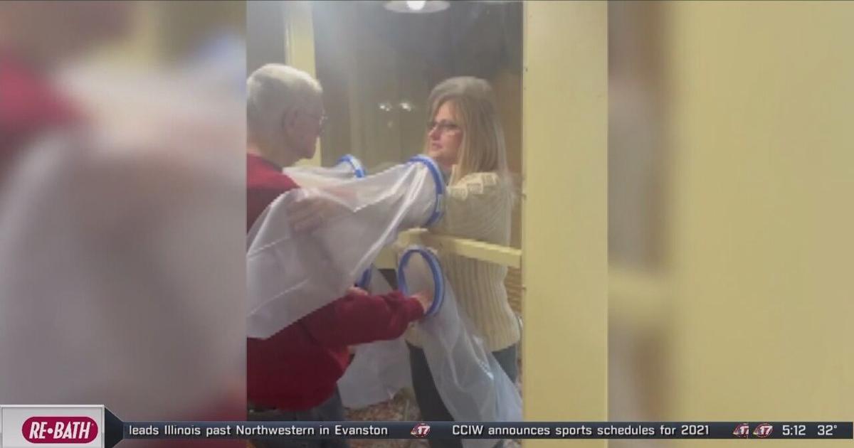 Assisted living facility sets up 'hugging booth' to help loved ones ...