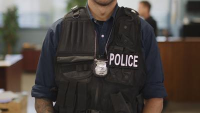 Police officer with badge