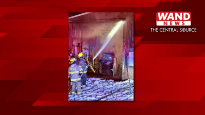 Skid loader starts pole barn fire