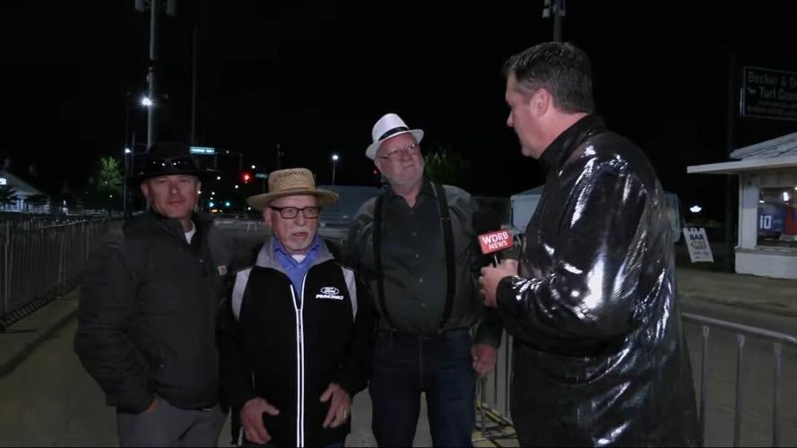 Keith Kaiser runs into some Hoosiers waiting to get into Churchill Downs