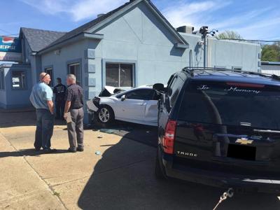 SUV crashes into car at Decatur restaurant