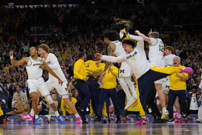NCAA UConn Michigan Basketball