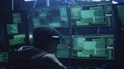 Cybercriminal in hideout