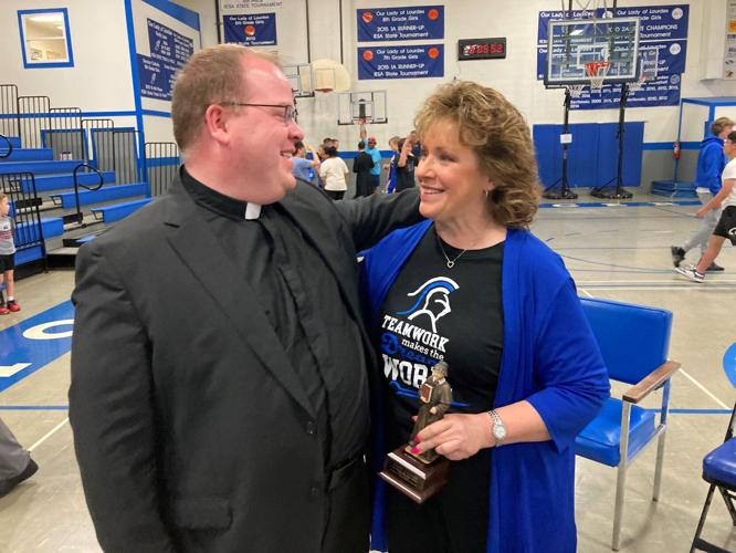 Valdahl with Fr. Michael Friedel, pastor.jpg