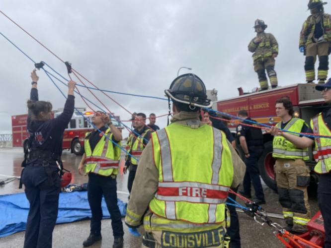 Louisville fire rescues driver