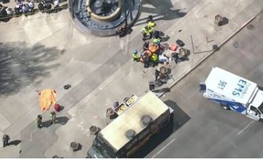 Van hits Toronto pedestrians; driver in custody
