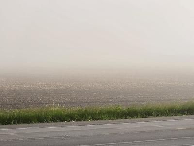 Dust blowing in field, dust storm