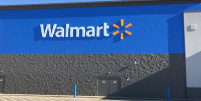 Business owner pays for layaway items