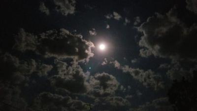 partly cloudy night sky