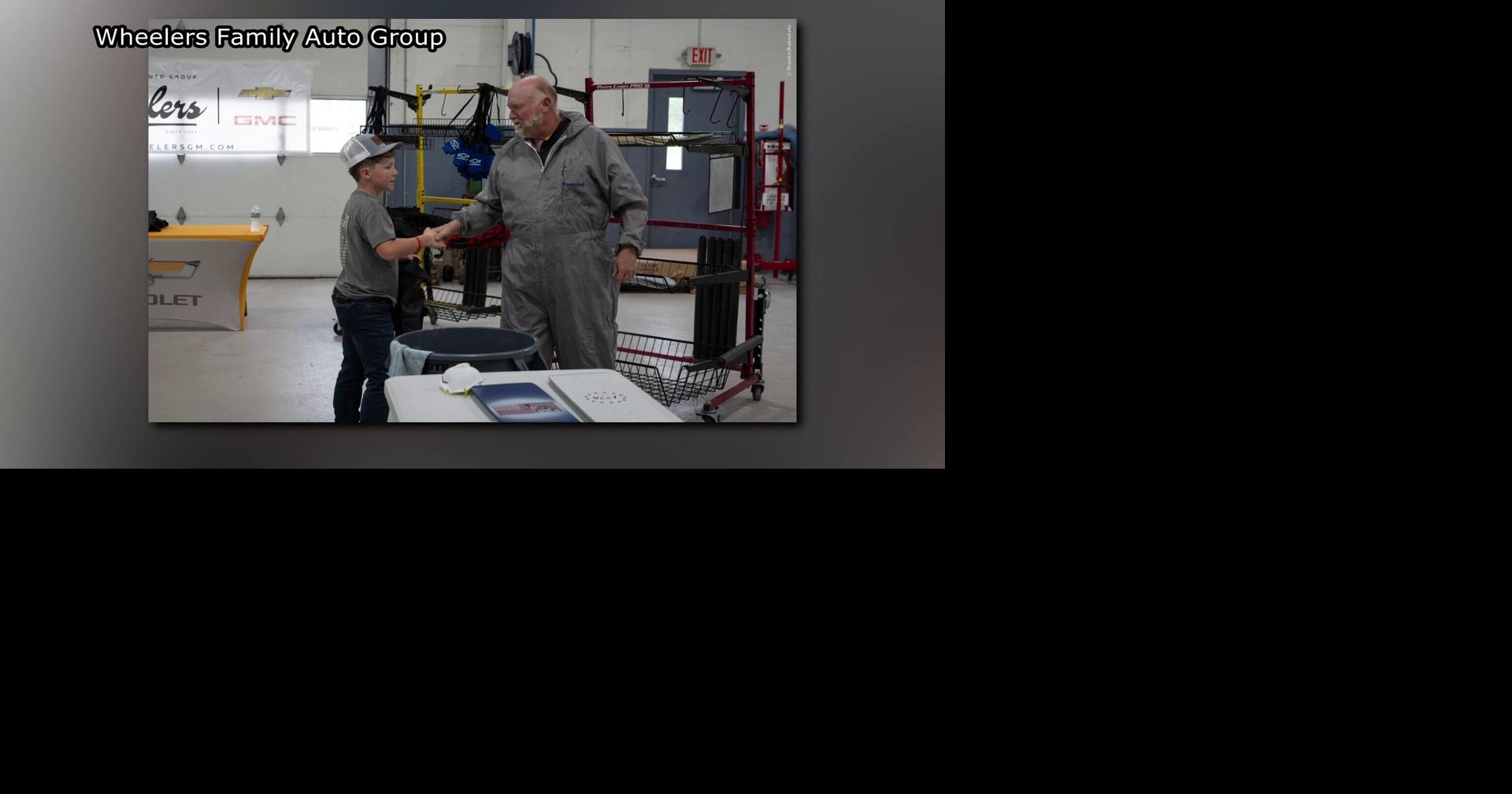 Wheelers Family Auto Group teaches Wisconsin Rapids middle schoolers car painting skills