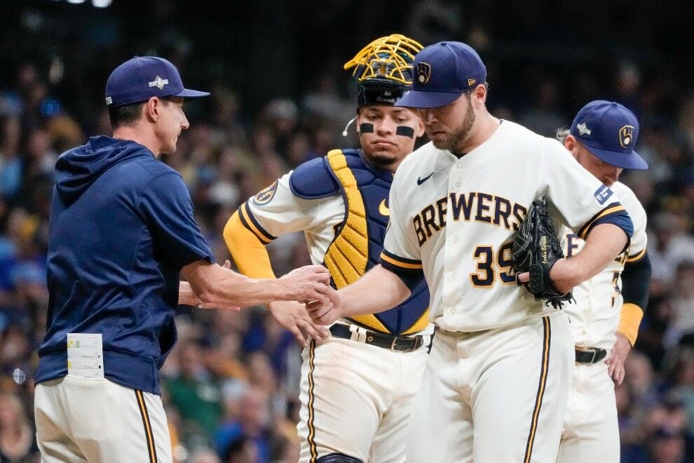 Brewers' Arnold continues waiting on Counsell while expressing
