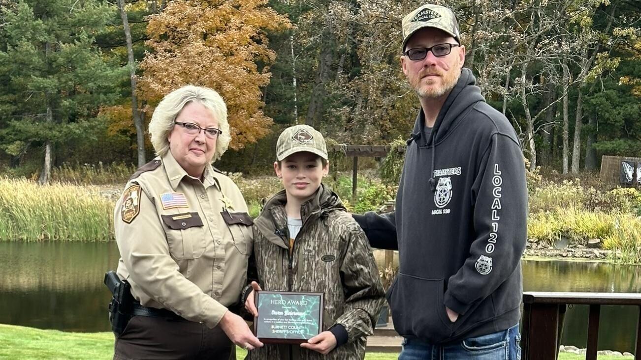 Boy receives Hero Award for saving father from bear attack in