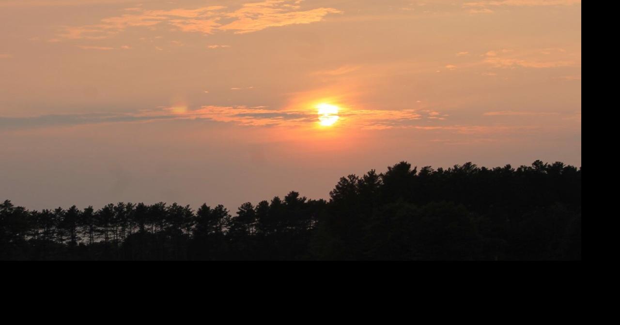 Hazy smoky sun and remaining warm