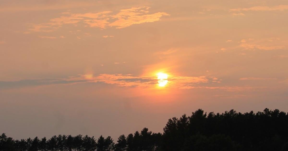 Hazy smoky sun and remaining warm