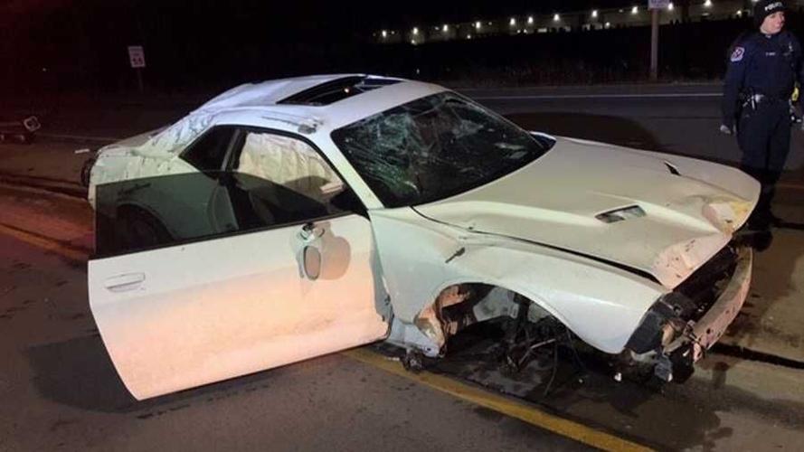 Challenger 'traveling over 100 MPH' hits car crash scene on I-696; car cut  in half