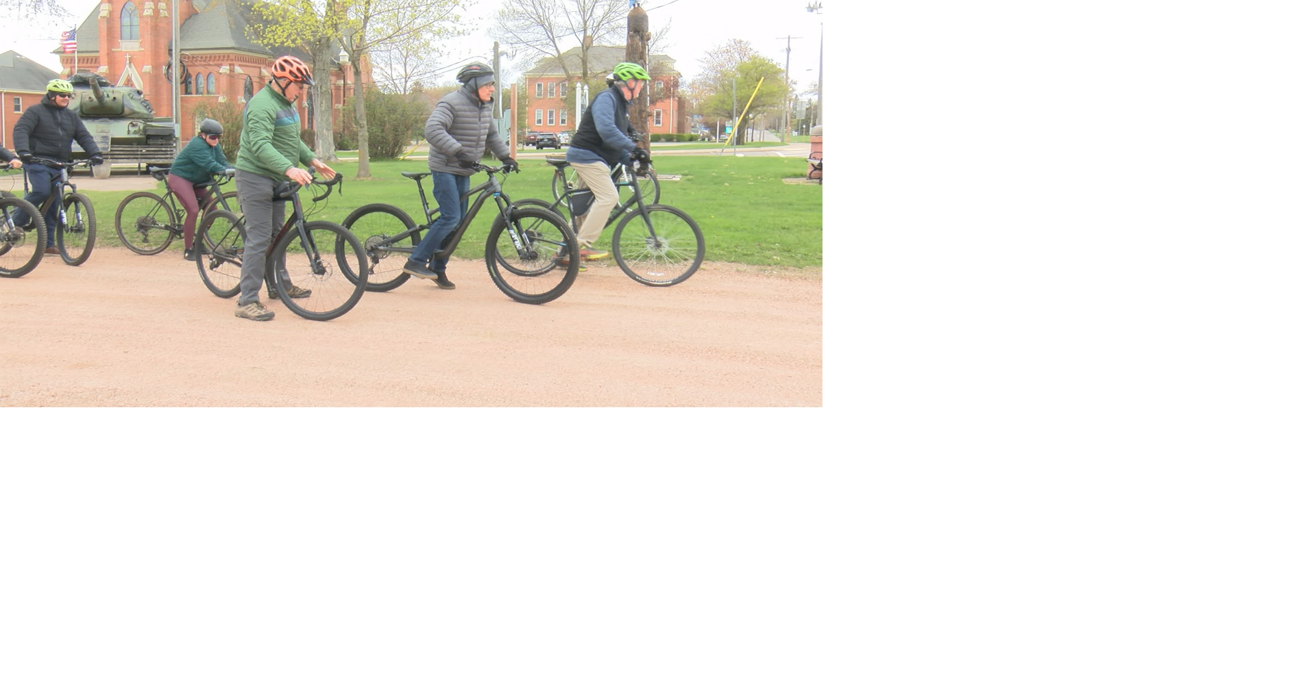 Governor Evers bikes Athens gravel trails in celebration of national tourism week