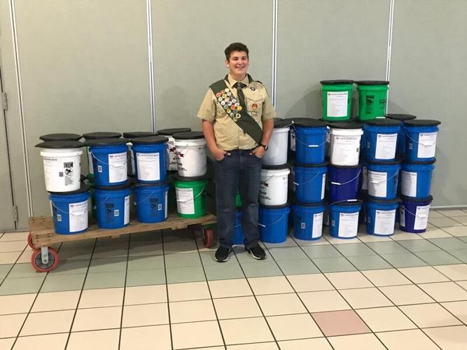 Superior teen distributes lockdown buckets to elementary school for