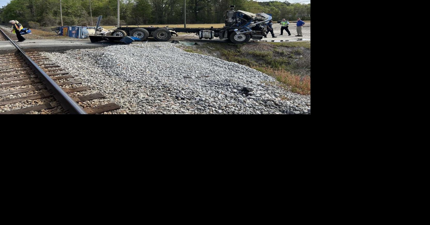 Train carrying more than 100 passengers slams into garbage truck in ...