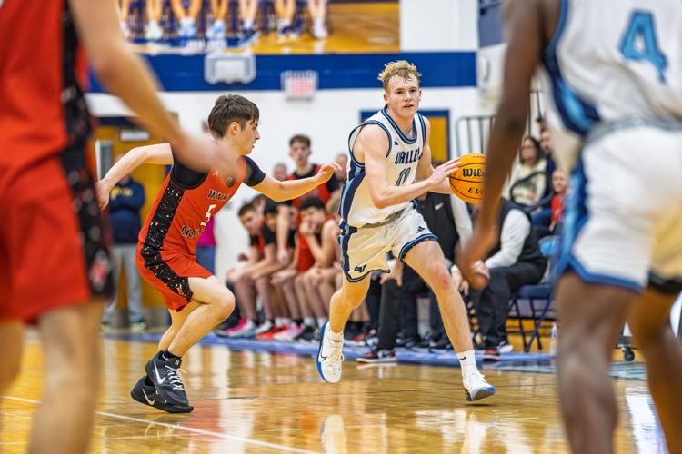 Prep boys basketball: Spring Valley staves off Wayne in first meeting ...