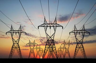 3D Electric powerlines over sunrise