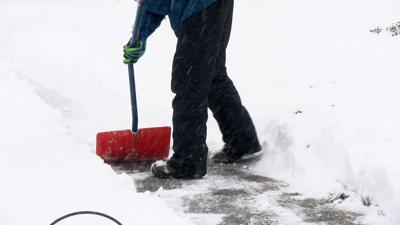 Shoveling Amid Snowfall