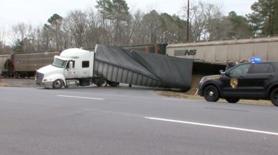 Tractor-trailer vs train