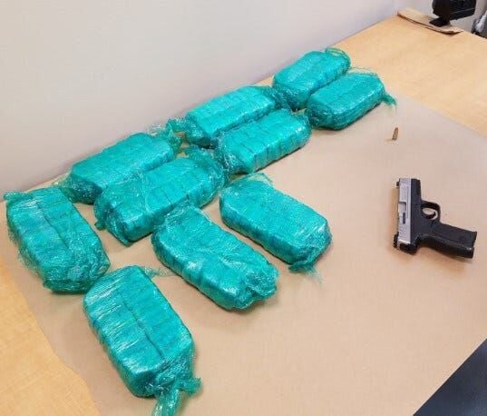 Two Arrested for Drugs & Firearm in Dover