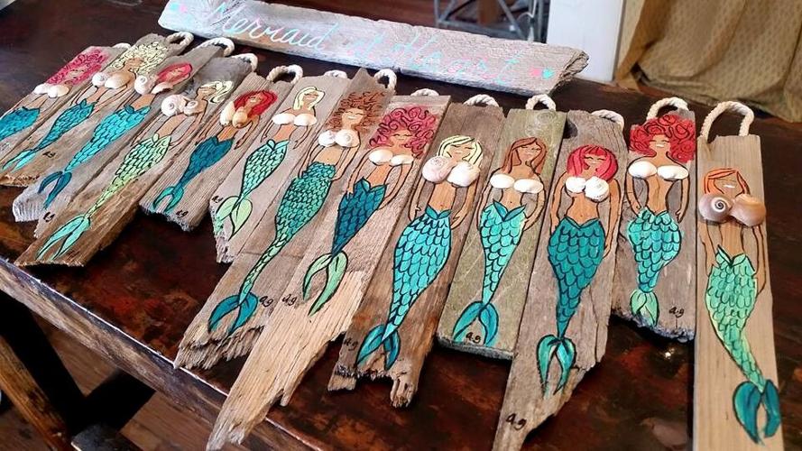 #mermaid paintings on recycled Ocean City Beach fencing..by local artist, Ashley Garland!! #localmojo