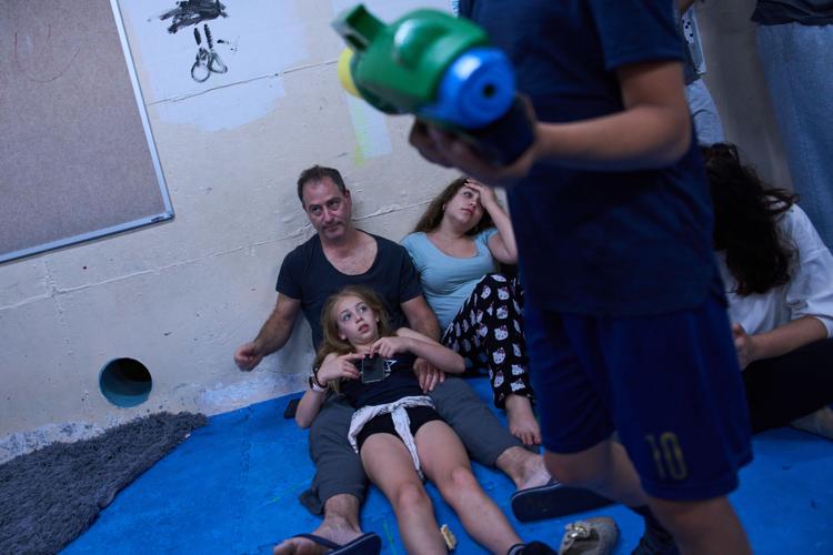 Israel and Iran exchange strikes after Beirut attack, in photos