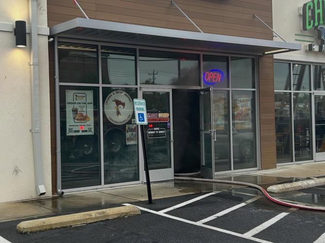 The entrance of Crimson Coward in Salisbury, with smoke in the building.