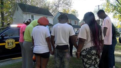 Praying at Scene of Laurel Shooting