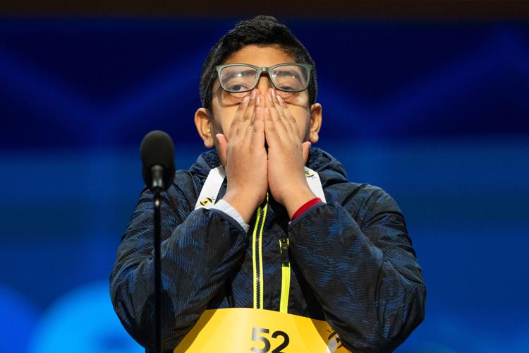 Photos of students competing for the Scripps National Spelling Bee trophy