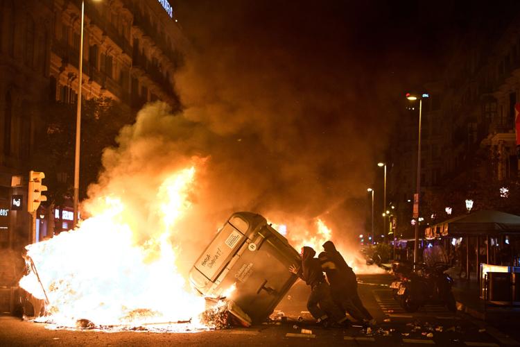 Housing protests erupt in Barcelona as Spain calls early election, in photos