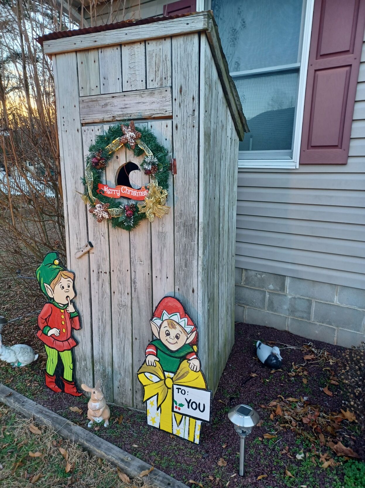 Dean Adkins' decorated outhouse in Laurel, Del.