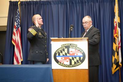 Worcester County Sheriff Matt Crisafulli is sworn in as President of the Maryland Sheriffs' Association by retired Pocomoke City Police Chief Lee Brumley.