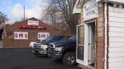 Santa Claus Sets Up Near Sex Shop