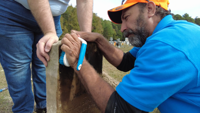 Cleaning a gravestone