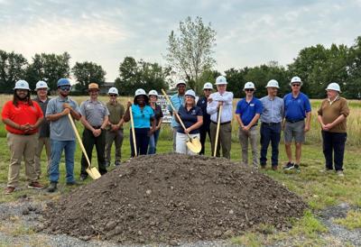 Cambridge and federal officials pose for a photo during the groundbreaking ceremony for Leonard Lane Park