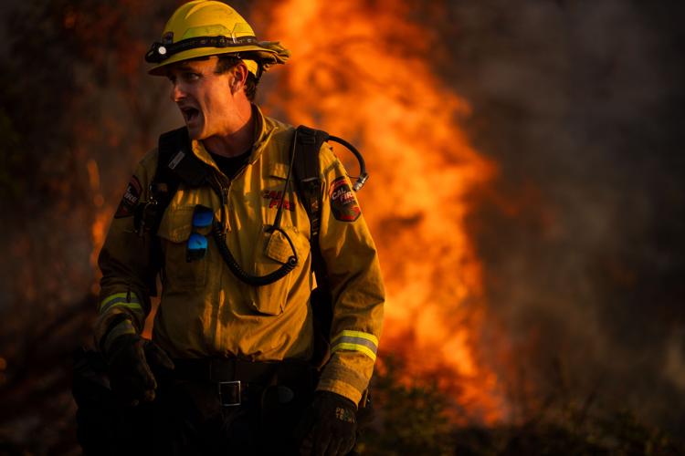 Photos show firefighters battling Southern California blaze