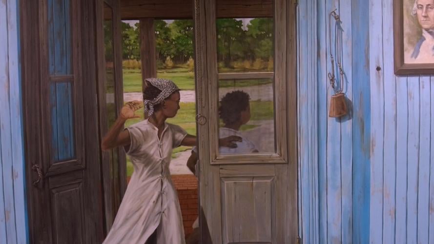 Harriet Holding up her hand before she is hit