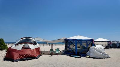 Campers brave the extreme heat on Assateague Island National Seashore.
