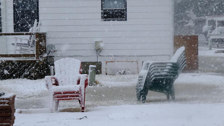 Snow covered chairs