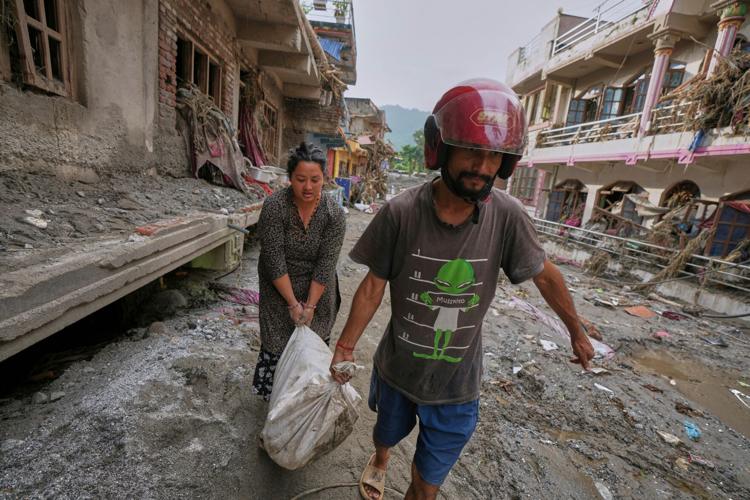 Photos show aftermath of flash floods in Nepal